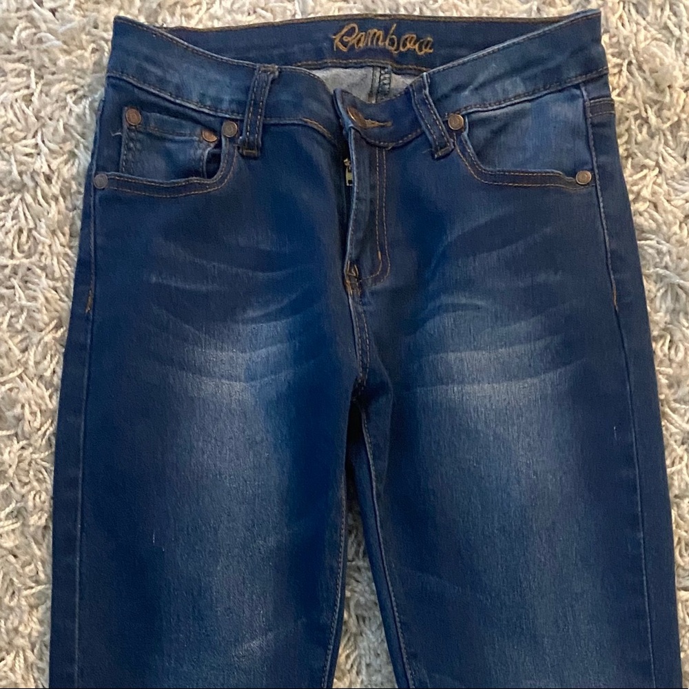 Navy blue distressed jeans